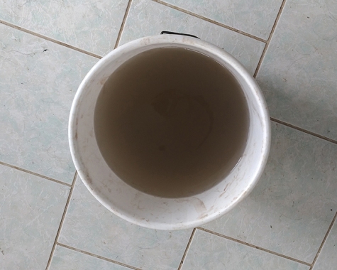 bucket of black water